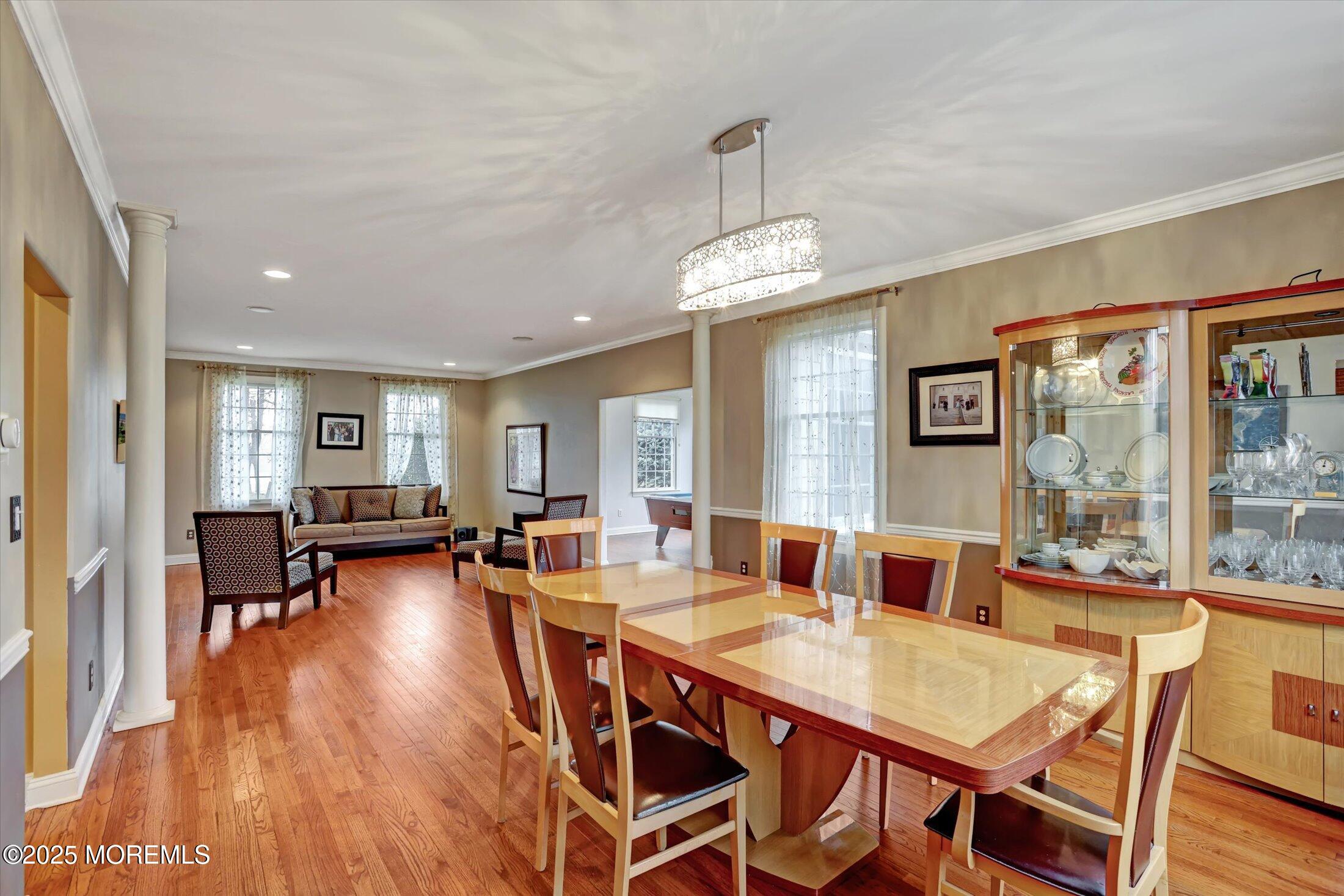 330 Randolph Road Freehold, NJ 07728 - Photo 22 of 63 a view of a dining room with furniture window and wooden floor