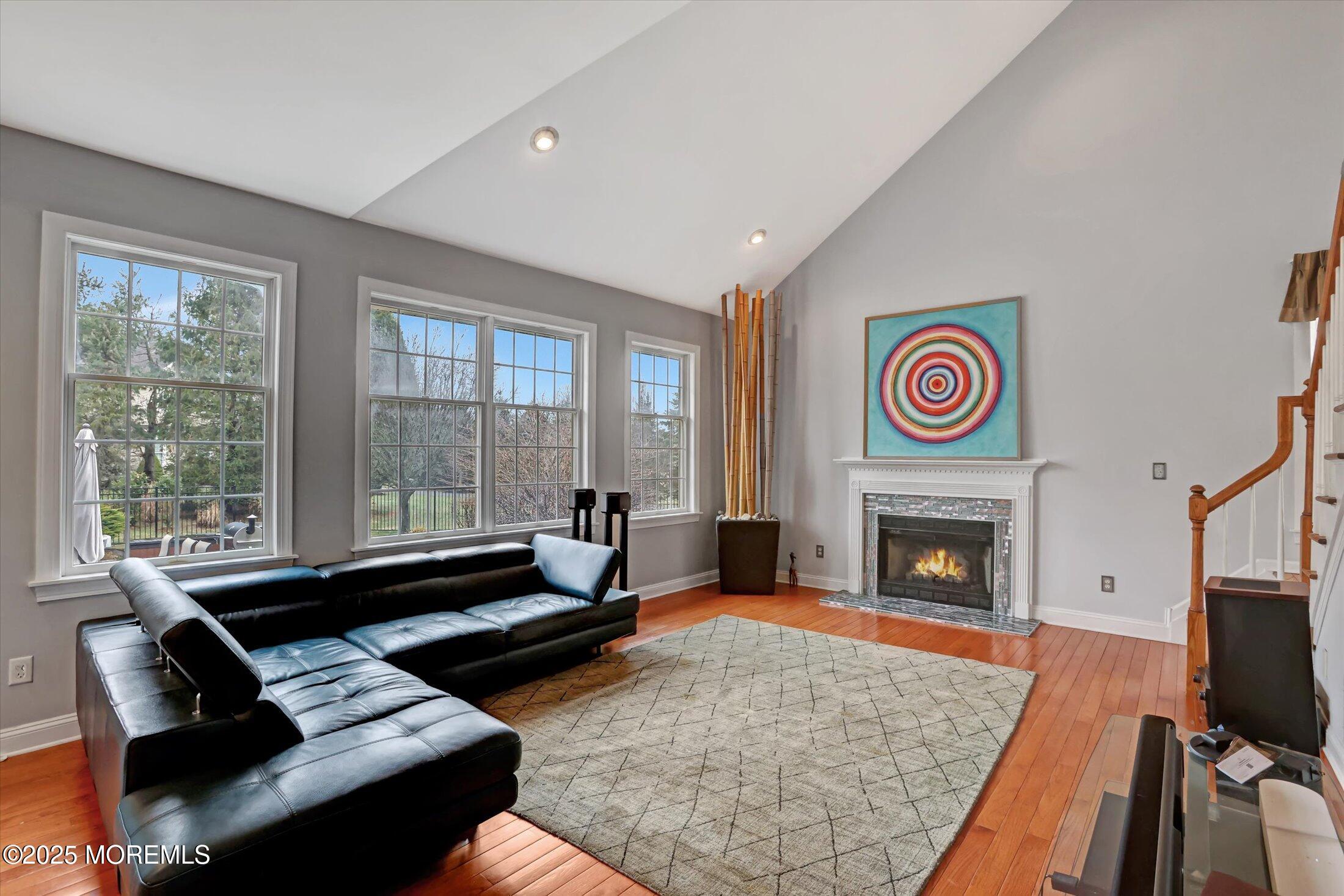 330 Randolph Road Freehold, NJ 07728 - Photo 25 of 63 a living room with furniture and a fireplace