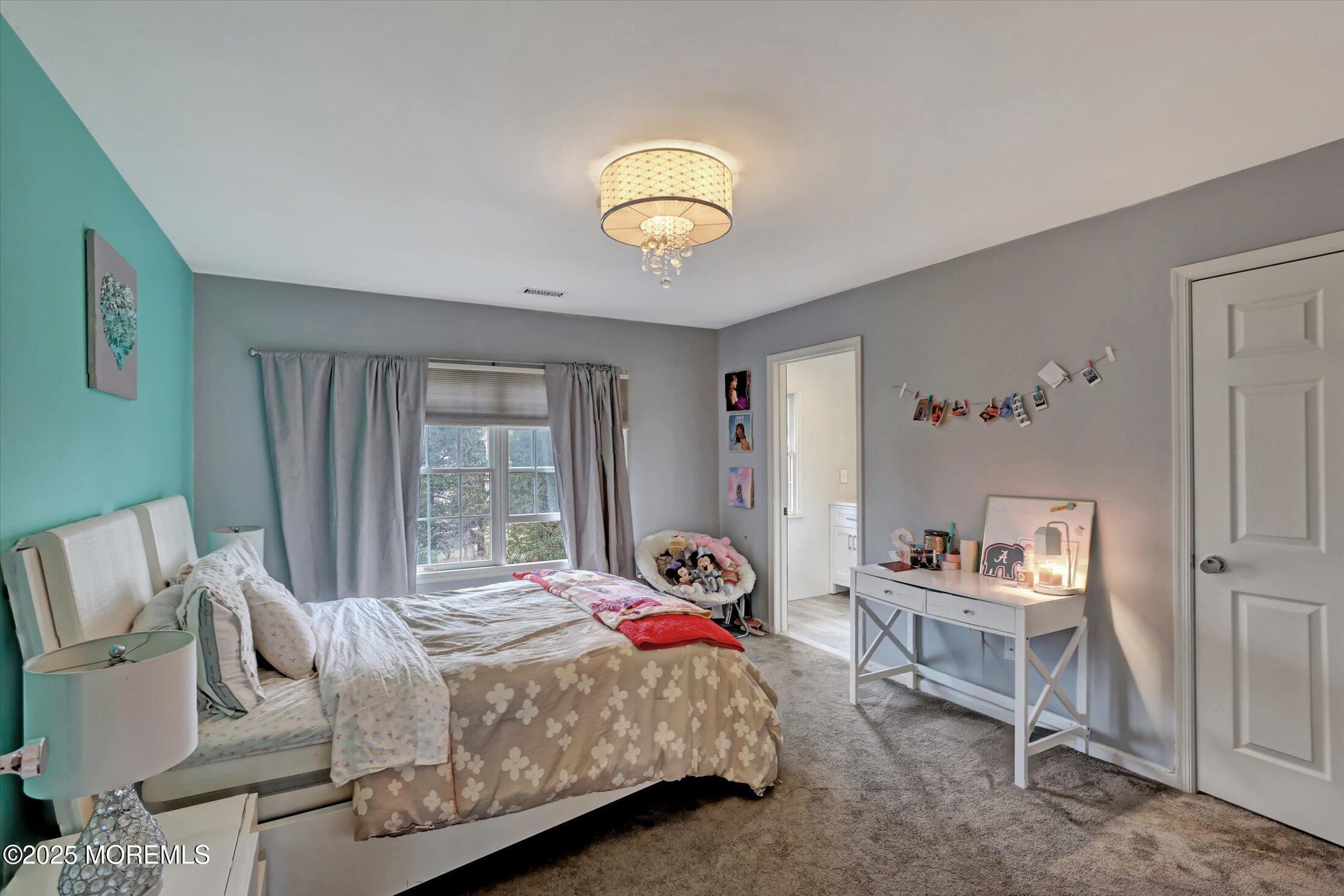 330 Randolph Road Freehold, NJ 07728 - Photo 31 of 63 a bedroom with a bed and a window