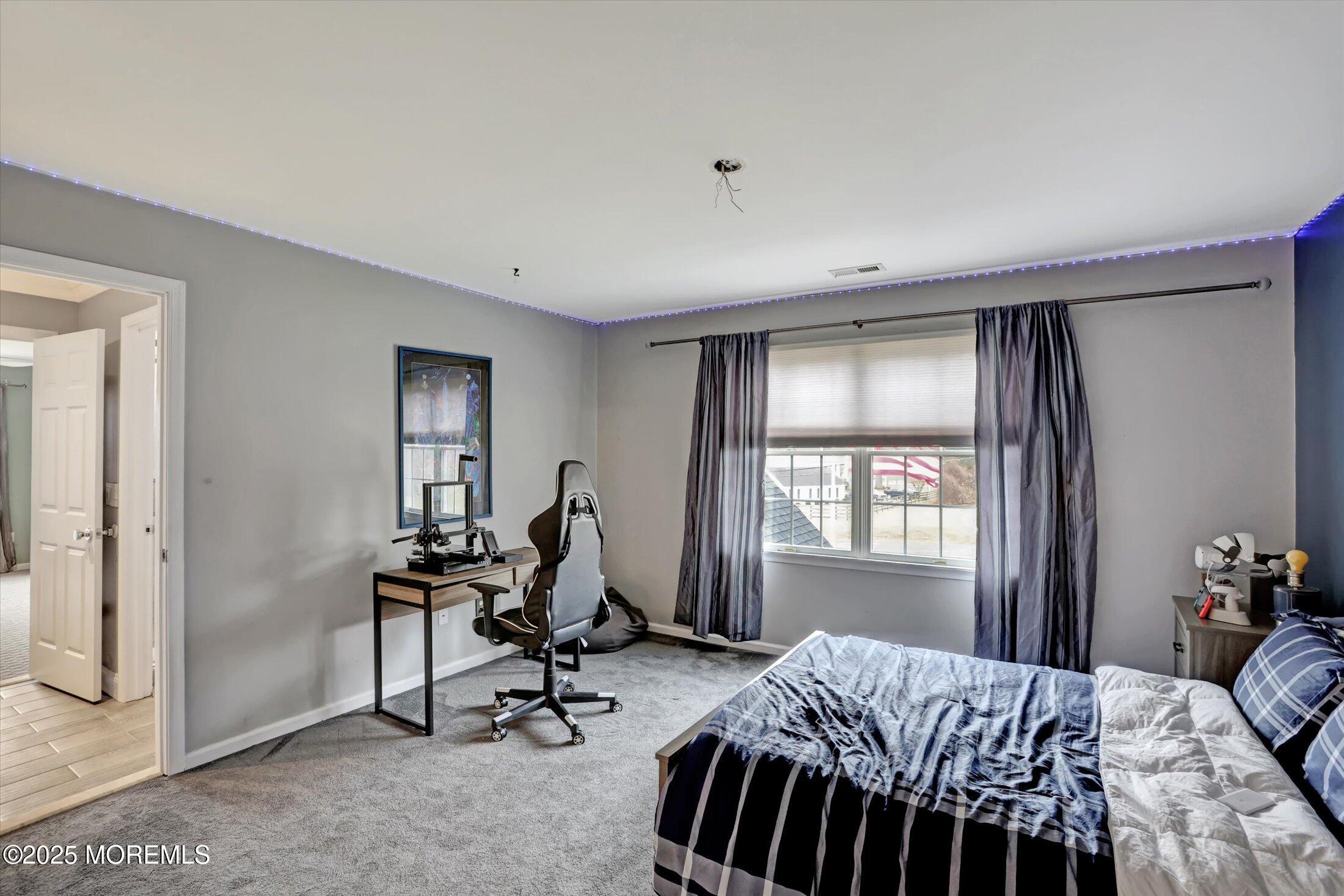 330 Randolph Road Freehold, NJ 07728 - Photo 33 of 63 a bedroom with a bed and a window