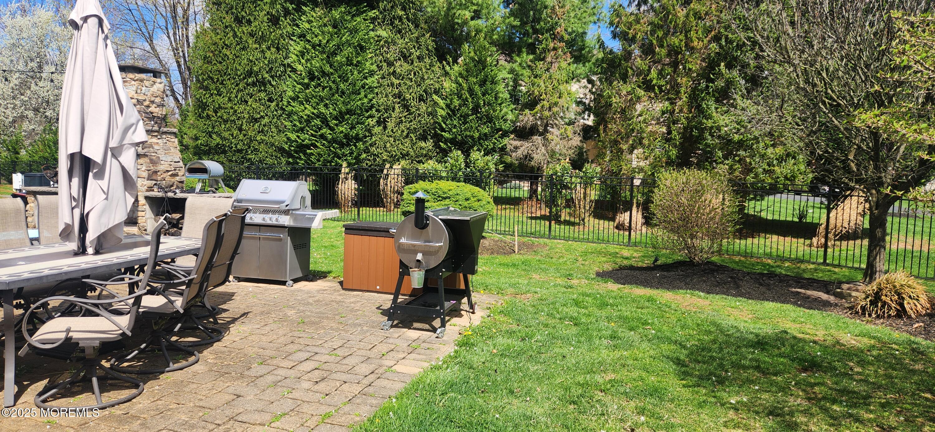 330 Randolph Road Freehold, NJ 07728 - Photo 39 of 63 a view of a backyard with sitting area