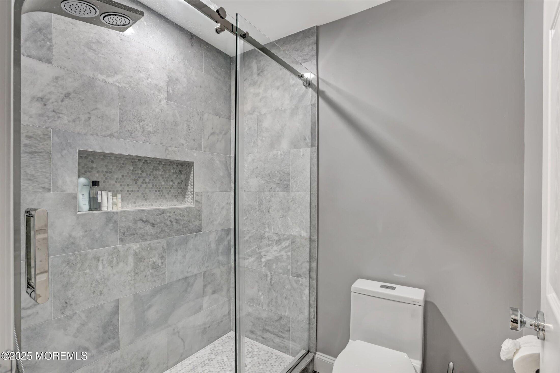 330 Randolph Road Freehold, NJ 07728 - Photo 45 of 63 a bathroom with a shower and toilet