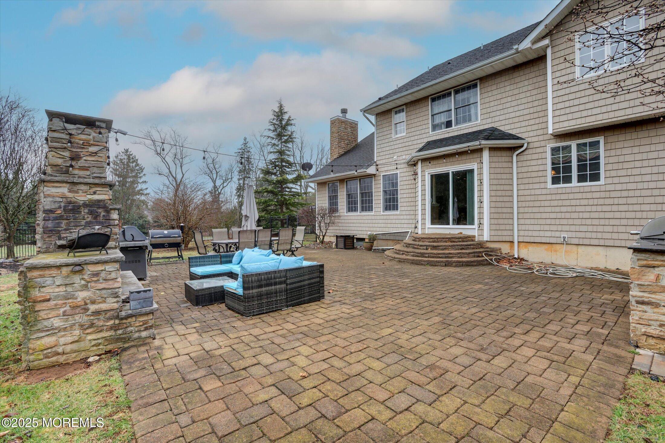 330 Randolph Road Freehold, NJ 07728 - Photo 52 of 63 a front view of a house with sitting area