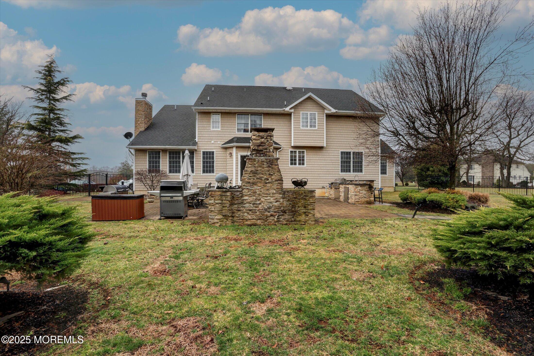 330 Randolph Road Freehold, NJ 07728 - Photo 54 of 63 a front view of a house with garden