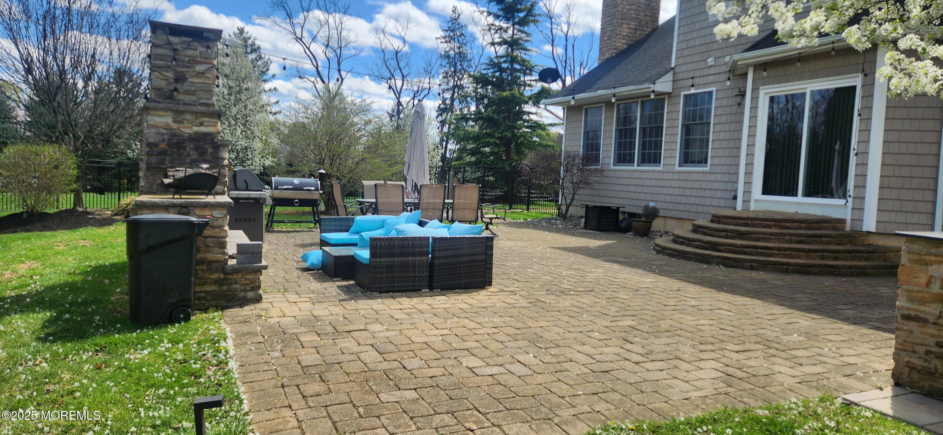 330 Randolph Road Freehold, NJ 07728 - Photo 58 of 63 a view of a backyard with sitting area