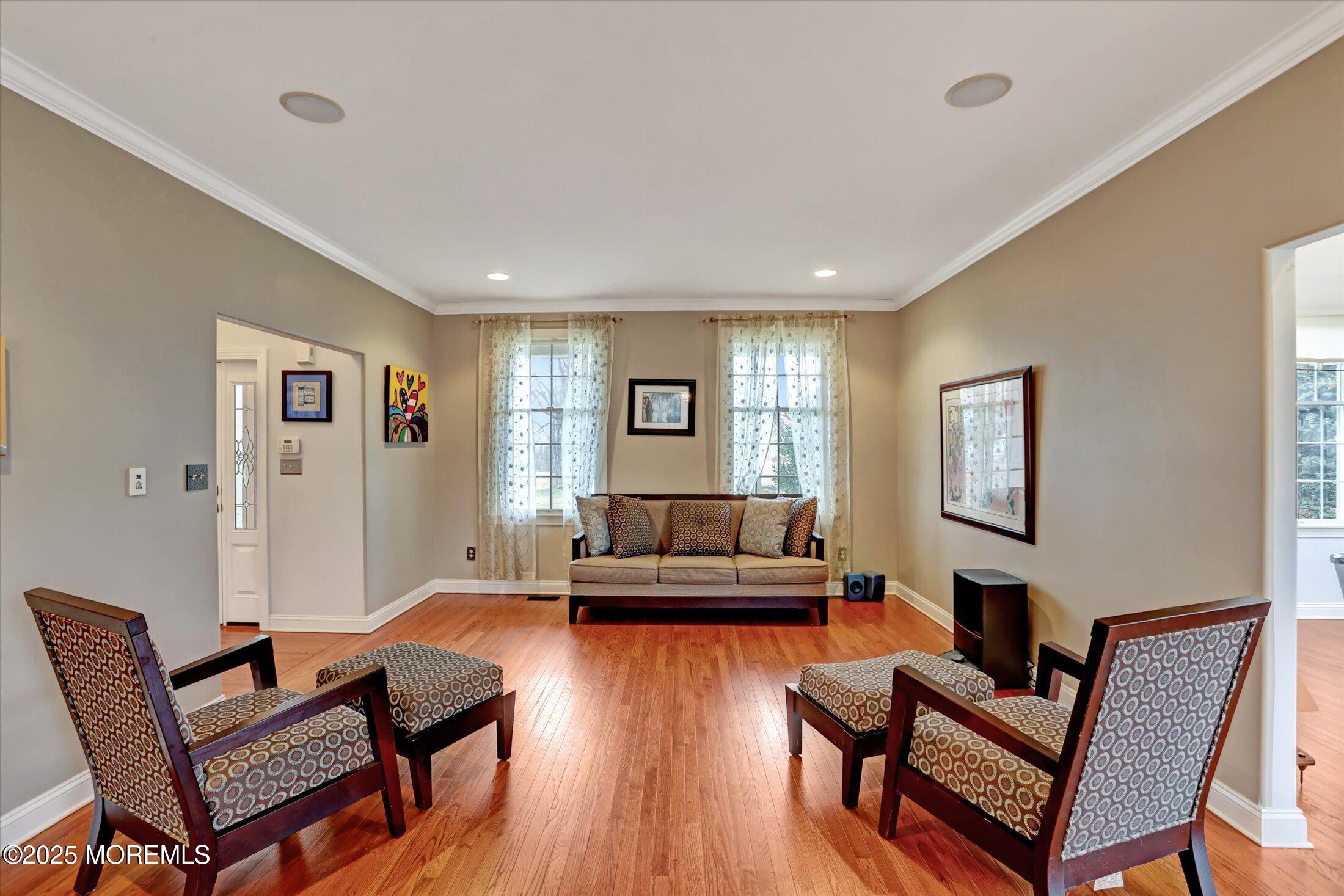 330 Randolph Road Freehold, NJ 07728 - Photo 8 of 63 a living room with furniture and a wooden floor