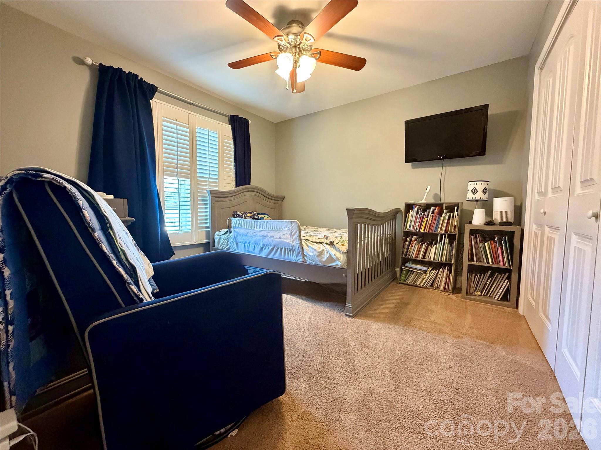 510 East Carpenter Street Maiden, NC 28650 - Photo 15 of 20 a living room with furniture and a flat screen tv