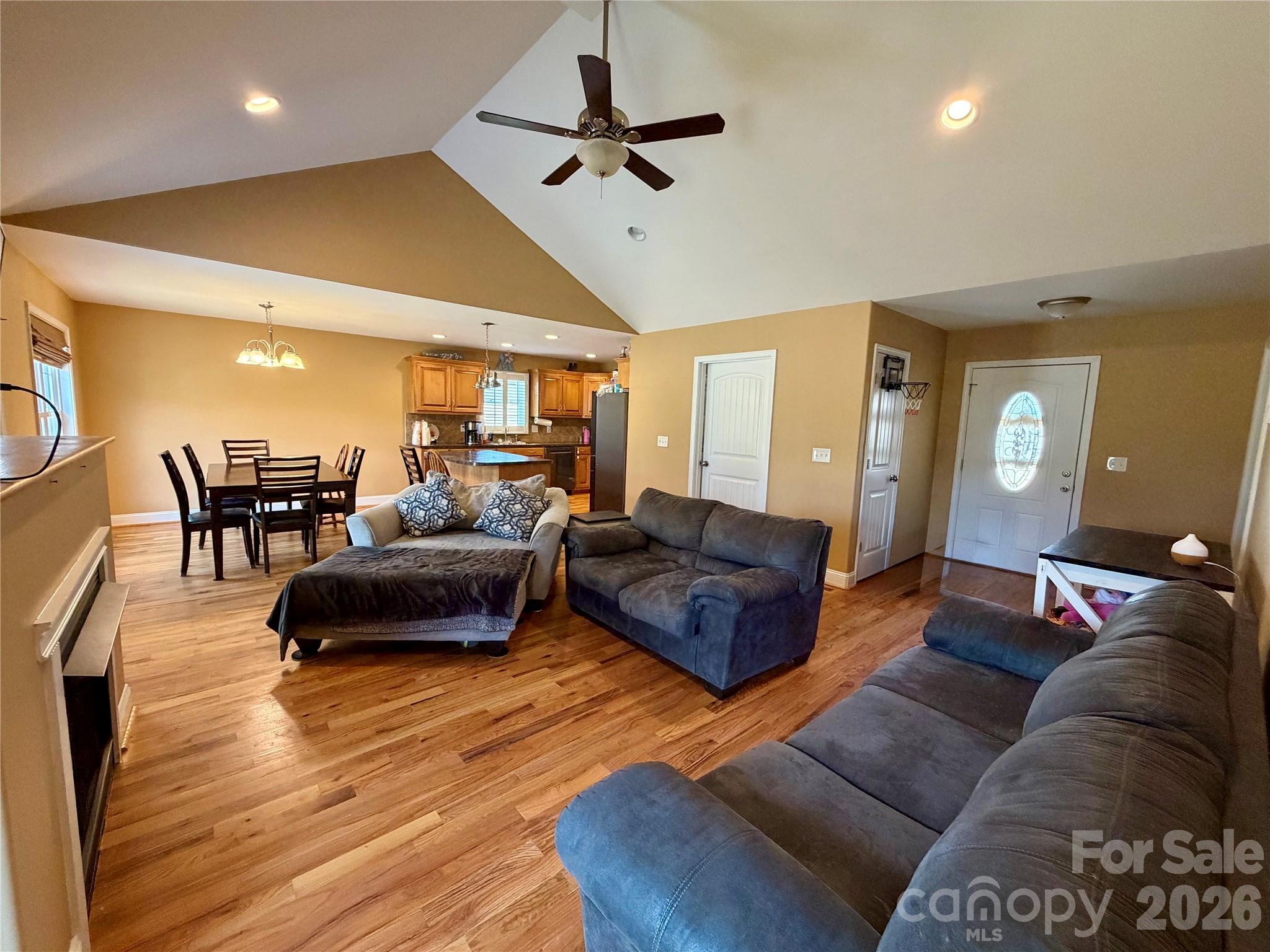 510 East Carpenter Street Maiden, NC 28650 - Photo 3 of 20 a living room with furniture ceiling fan and a wooden floor