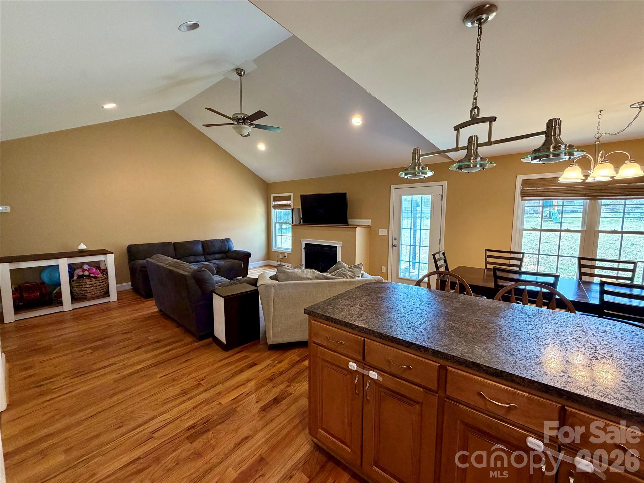 510 East Carpenter Street Maiden, NC 28650 - Photo 8 of 20 a kitchen with sink cabinets and wooden floor