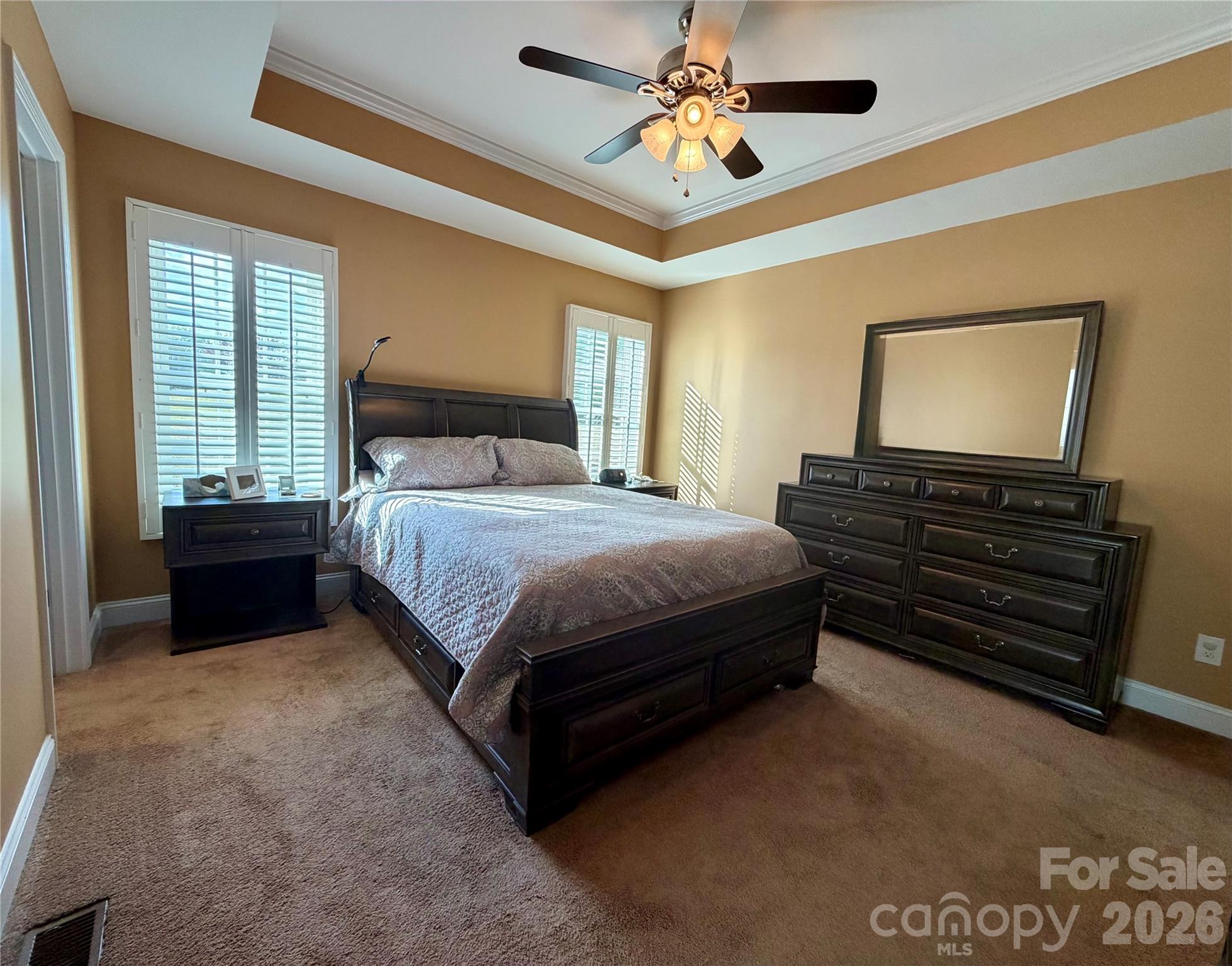 510 East Carpenter Street Maiden, NC 28650 - Photo 10 of 20 a bedroom with a bed dresser and a window