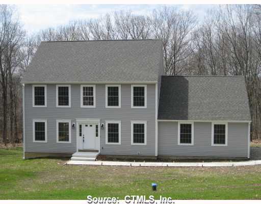 37 Woods Road Mansfield, CT 06250 - Photo 1 of 1 front view of house with a yard