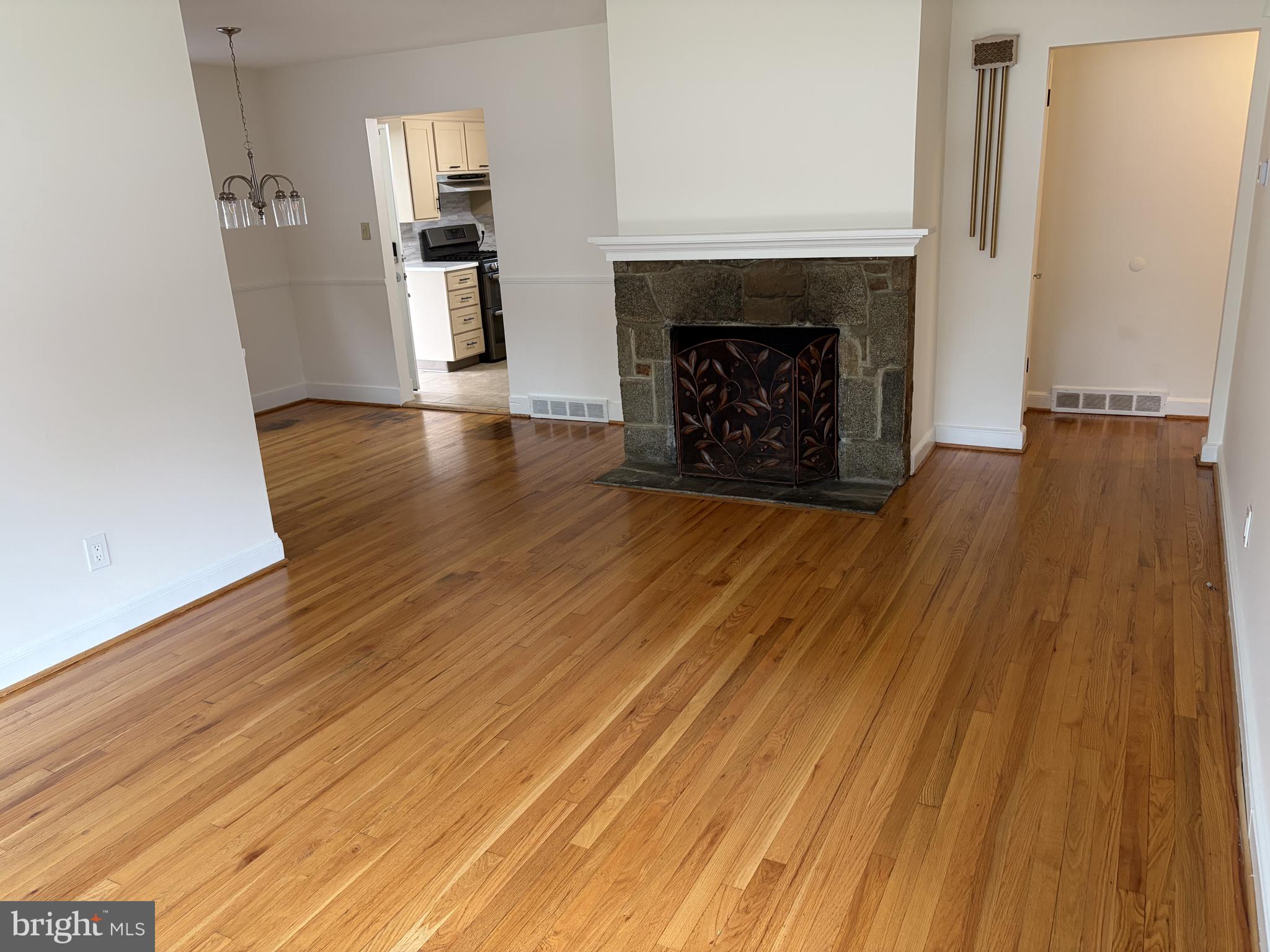 721 Edgemoor Road Wilmington, DE 19809 - Photo 16 of 52 Living room with fireplace looking toward D.R.