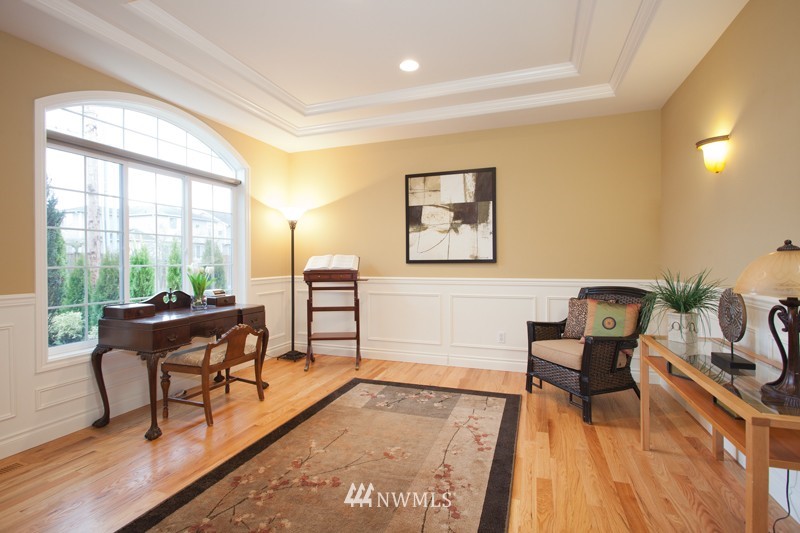 4806 Northeast 20th Place Renton, WA 98059 - Photo 2 of 17 a living room with furniture and a wooden floor