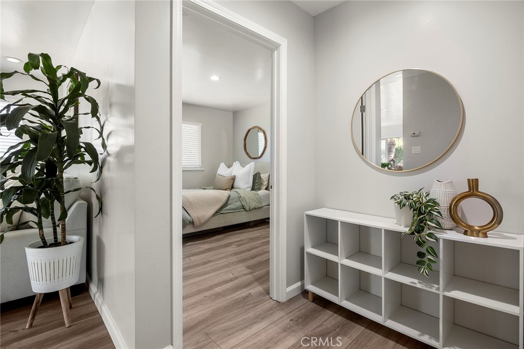 11629 185th Street Artesia, CA 90701 - Photo 11 of 20 a bedroom with bed and a potted plant