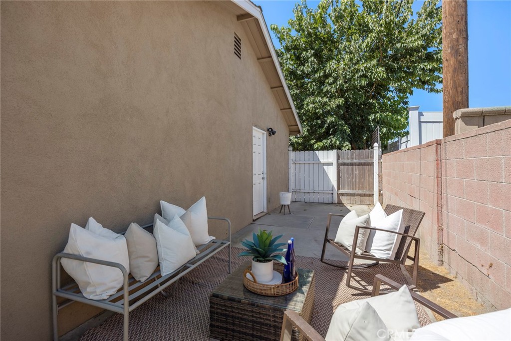 11629 185th Street Artesia, CA 90701 - Photo 20 of 20 a view of a chairs and table in patio