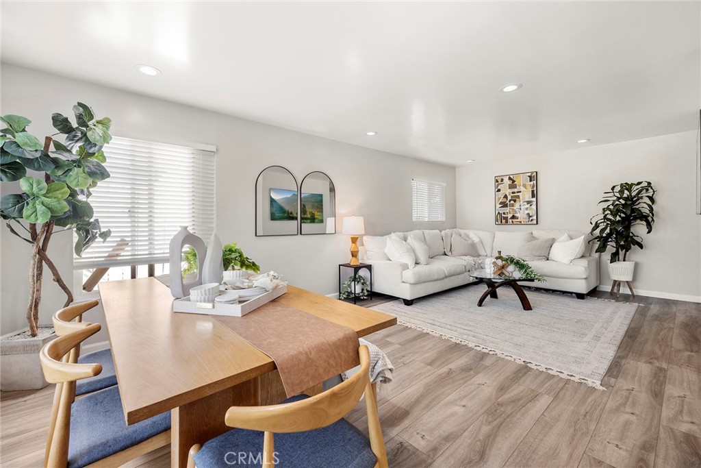 11629 185th Street Artesia, CA 90701 - Photo 2 of 20 a living room with furniture and a potted plant