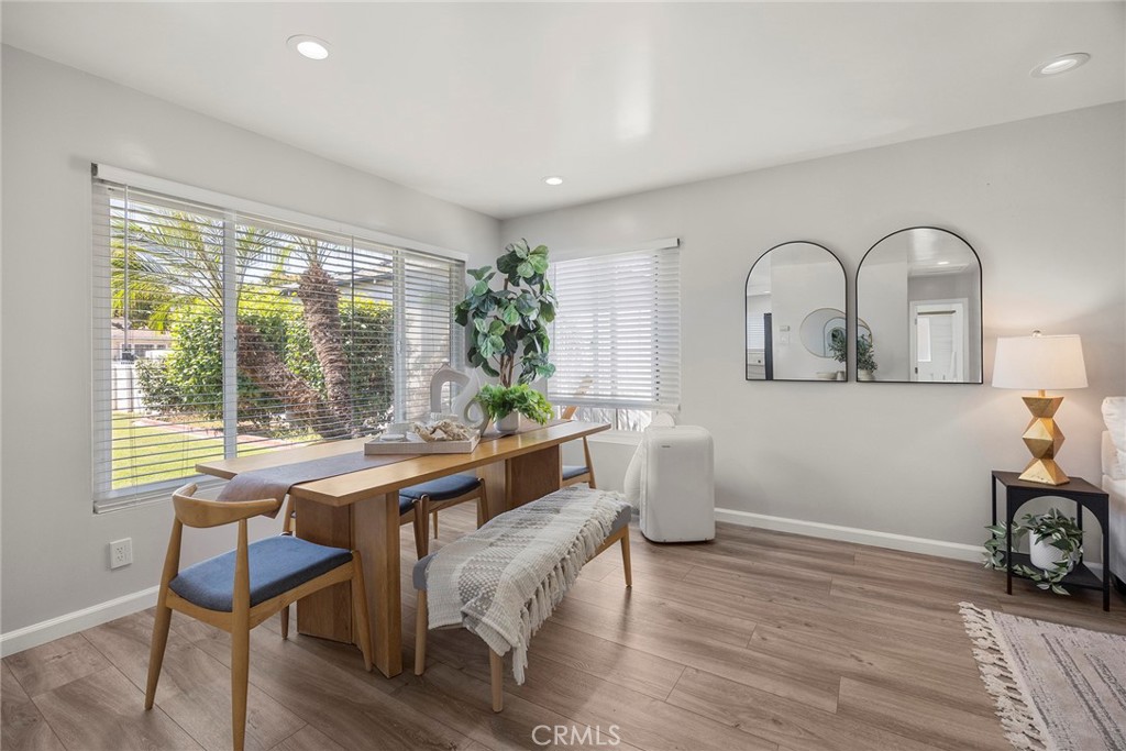 11629 185th Street Artesia, CA 90701 - Photo 5 of 20 a view of a workspace with furniture and a window