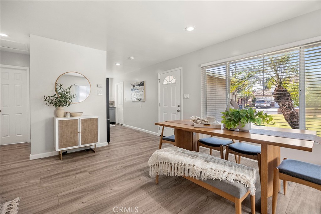 11629 185th Street Artesia, CA 90701 - Photo 6 of 20 a living room with furniture a table and a large window