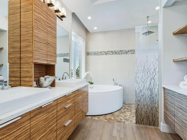 a kitchen with stainless steel appliances granite countertop a stove and a refrigerator
