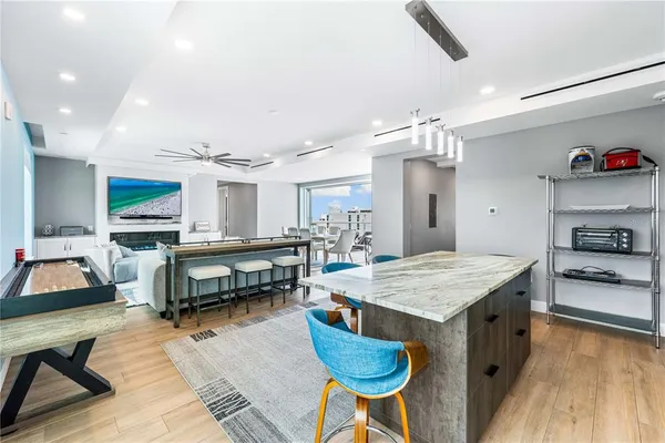 a view of a chairs and table in patio of the house