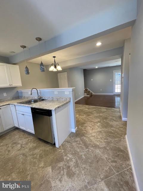 508 Blackbird Drive Bear, DE 19701 - Photo 5 of 22 a kitchen with granite countertop a sink and a stove