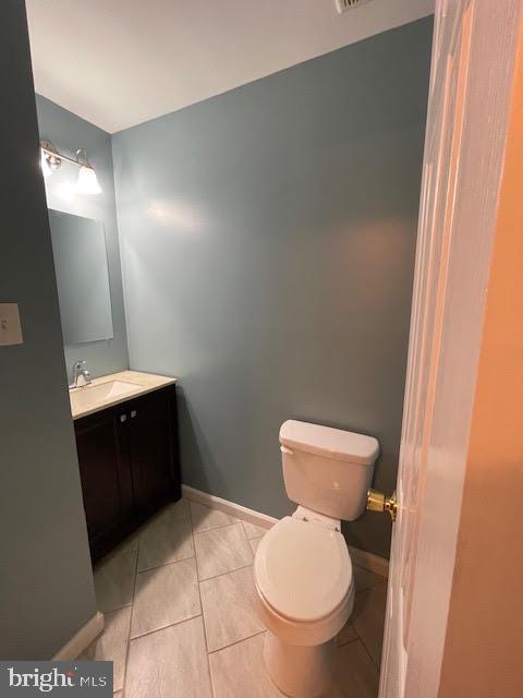 508 Blackbird Drive Bear, DE 19701 - Photo 6 of 22 a bathroom with a toilet and a mirror