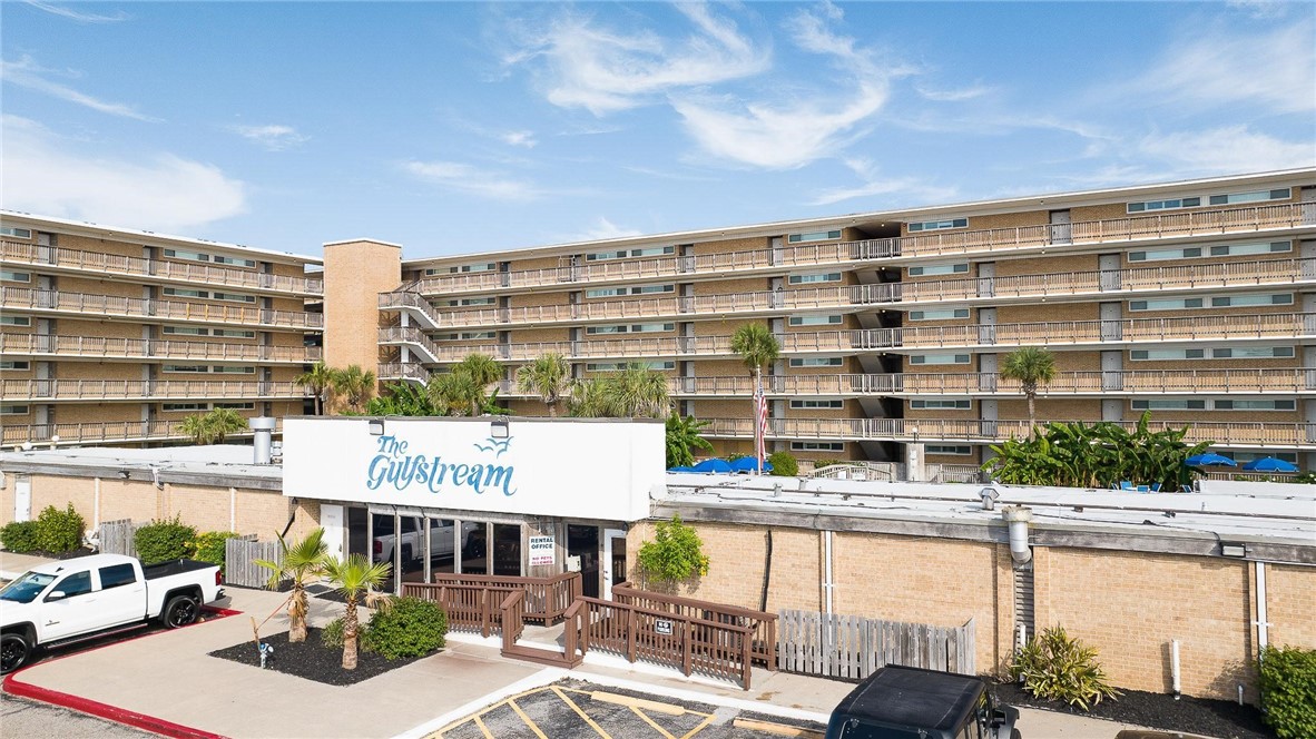 a front view of a building with street view