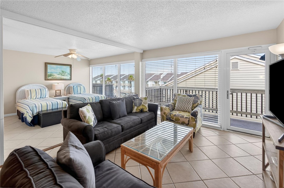 14810 Windward Drive, Unit 402 Corpus Christi, TX 78418 - Photo 13 of 39 a living room with furniture