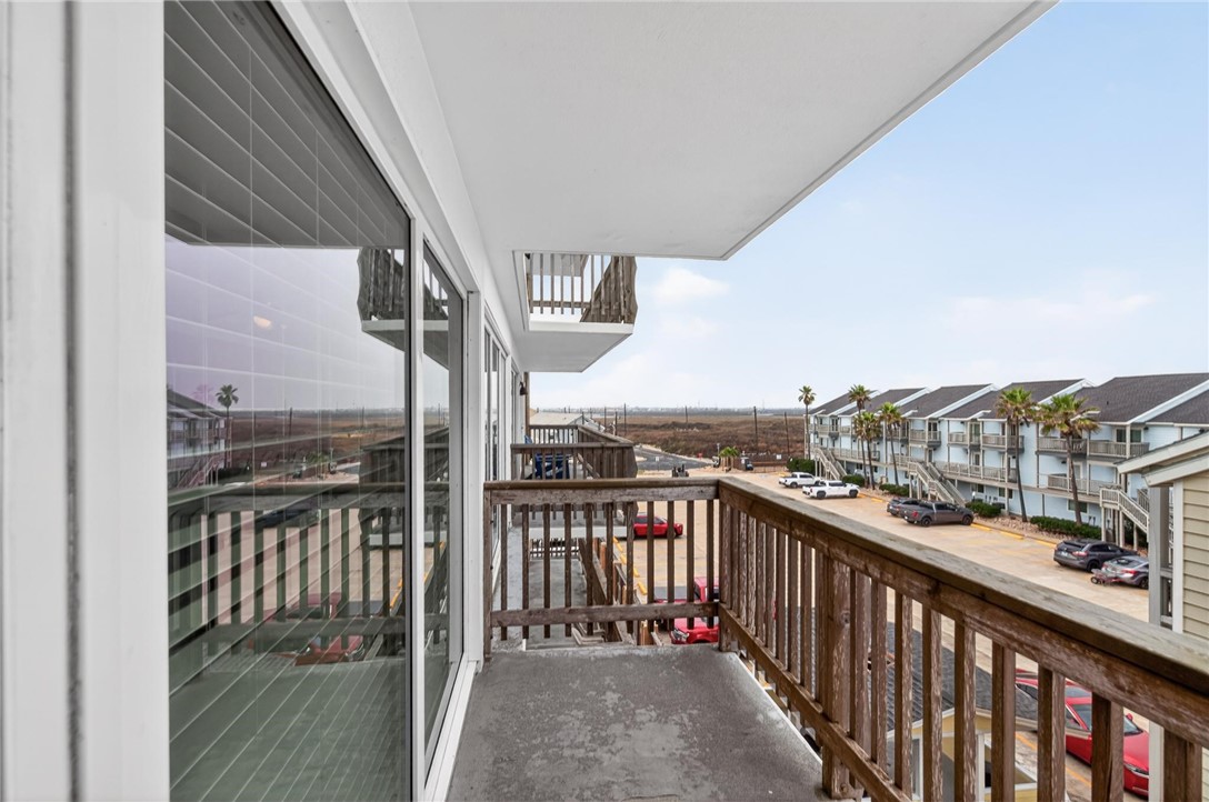 14810 Windward Drive, Unit 402 Corpus Christi, TX 78418 - Photo 26 of 39 a view of a balcony with city view