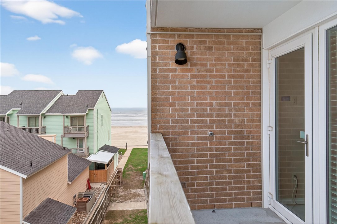 14810 Windward Drive, Unit 402 Corpus Christi, TX 78418 - Photo 28 of 39 a view of brick walls of the house