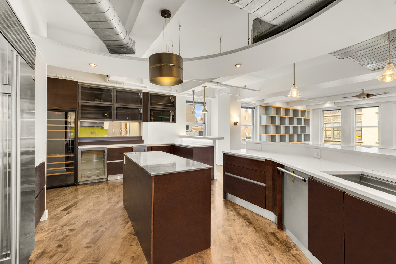 150 West 26th Street, Unit 802 Manhattan, NY 10001 - Photo 5 of 13 a kitchen with a stove a refrigerator and a sink