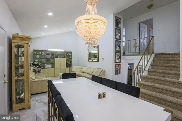 a view of a living room and dining room