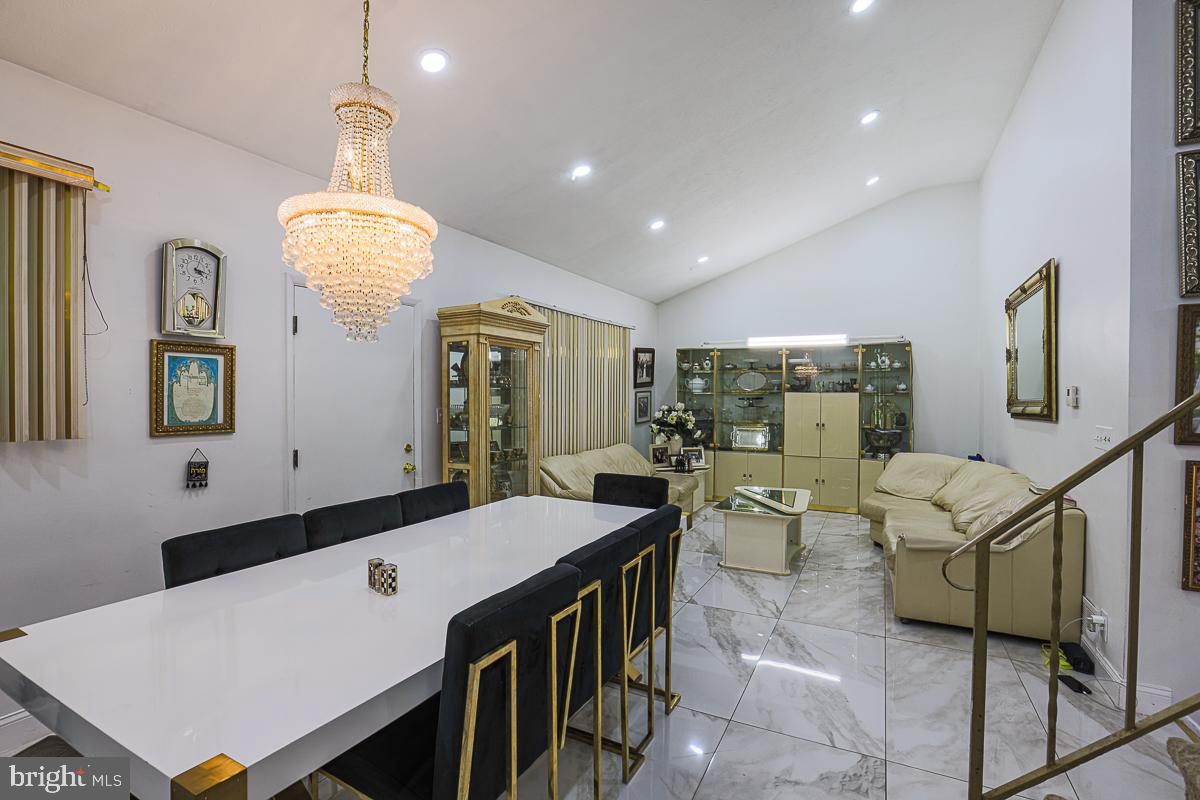 3111 Parkington Avenue Baltimore, MD 21215 - Photo 13 of 47 a view of a dining room with furniture