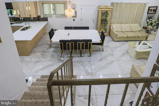 a living room with furniture and a table