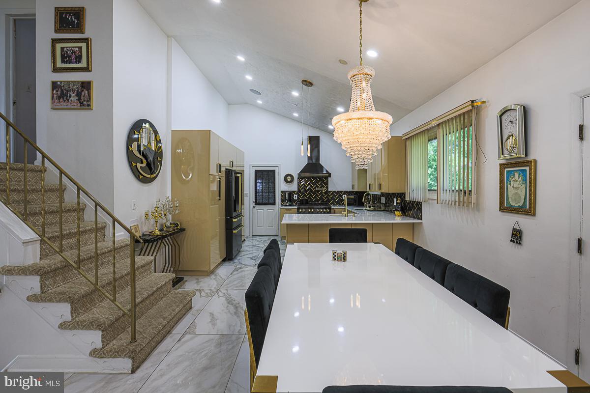 3111 Parkington Avenue Baltimore, MD 21215 - Photo 17 of 47 a lobby with furniture and a large window
