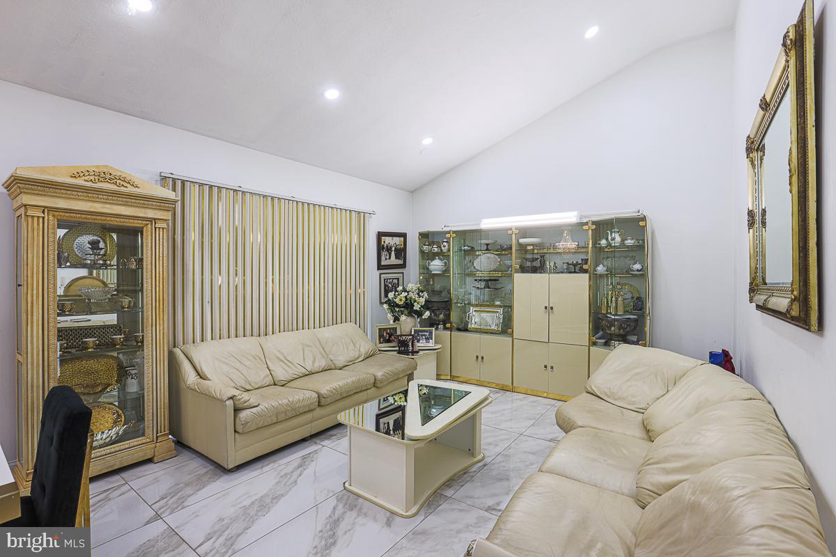 3111 Parkington Avenue Baltimore, MD 21215 - Photo 20 of 47 a living room with furniture and a large window