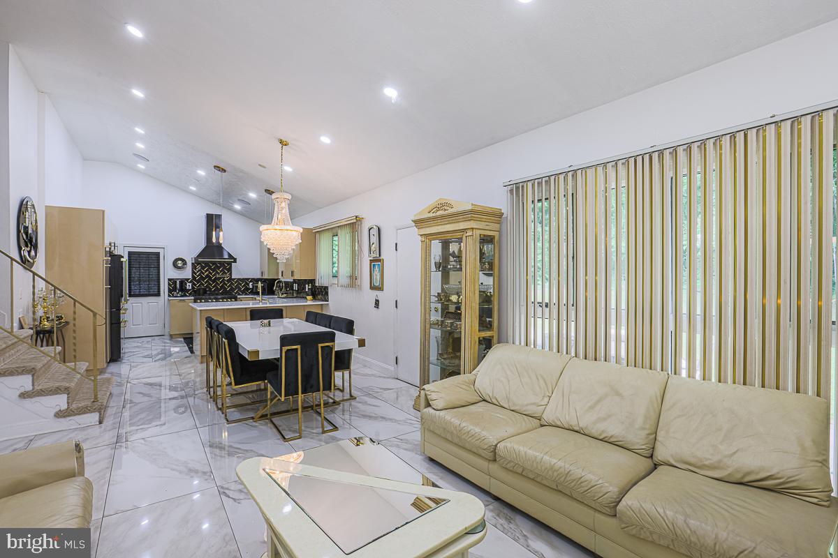 3111 Parkington Avenue Baltimore, MD 21215 - Photo 21 of 47 a living room with furniture and a large window