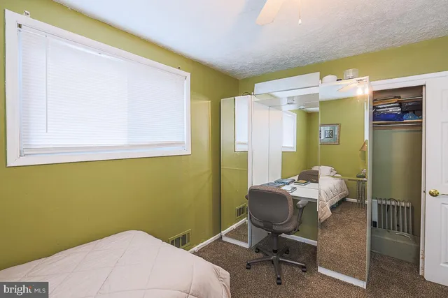 a workspace with furniture and a window