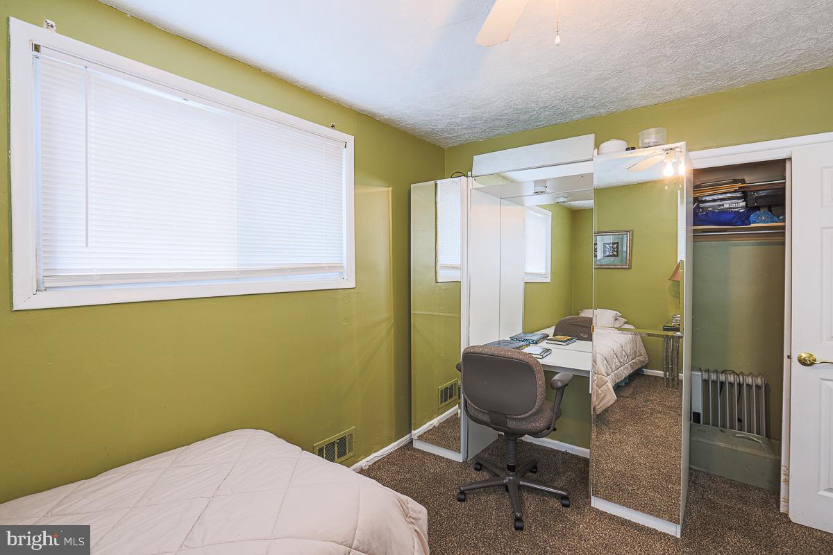 3111 Parkington Avenue Baltimore, MD 21215 - Photo 25 of 47 a workspace with furniture and a window