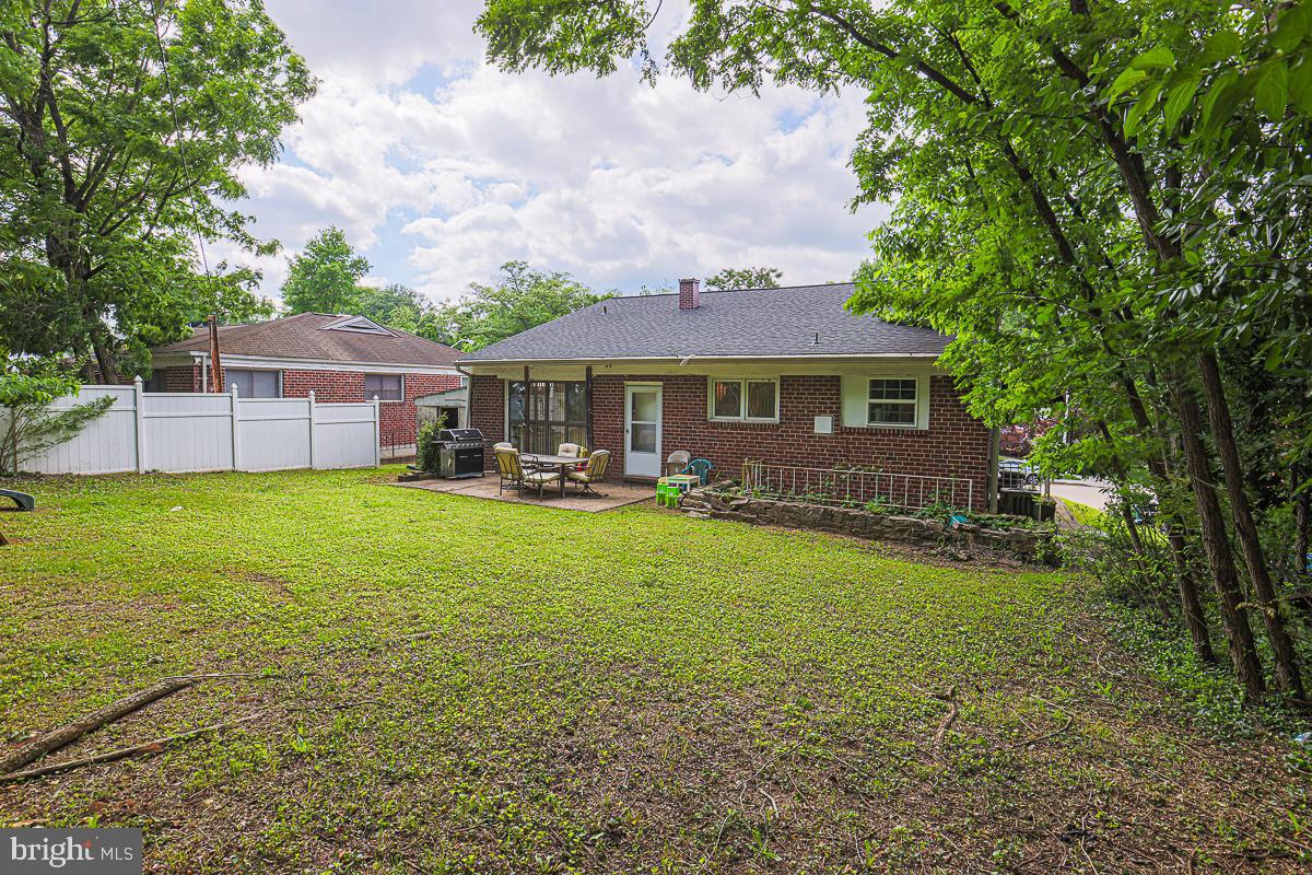 3111 Parkington Avenue Baltimore, MD 21215 - Photo 40 of 47 a front view of a house with garden