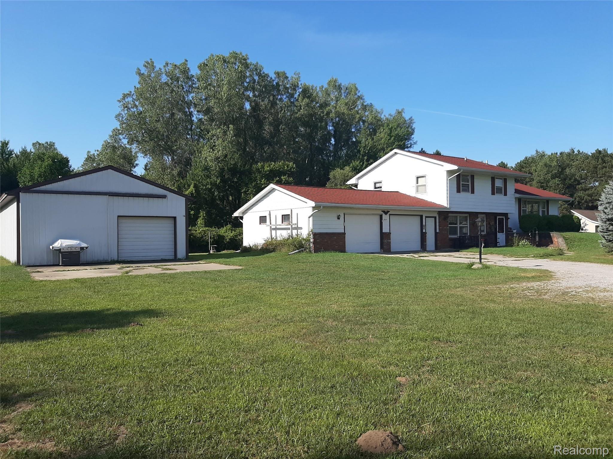 Large pole barn and garage