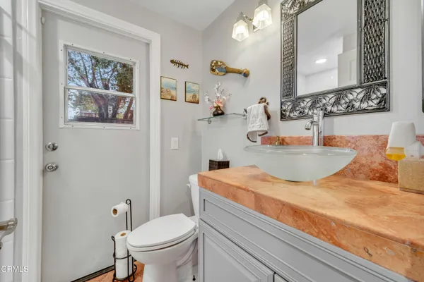 a bathroom with a sink and a toilet