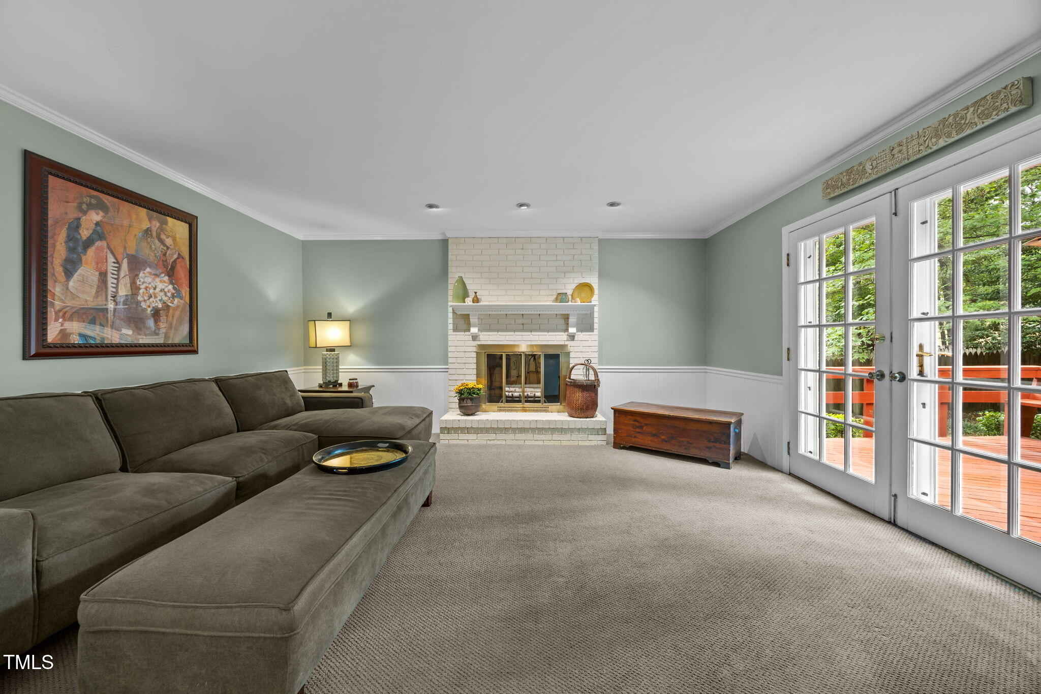 8009 Running Cedar Trail Raleigh, NC 27615 - Photo 17 of 42 a living room with furniture and a fireplace
