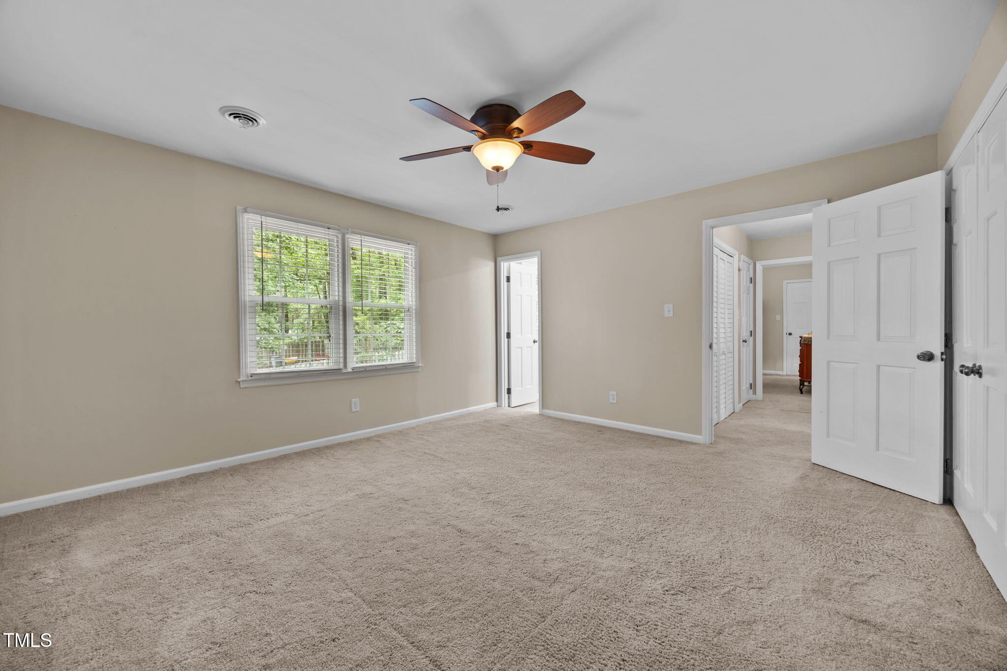 8009 Running Cedar Trail Raleigh, NC 27615 - Photo 21 of 42 a view of an empty room with a window