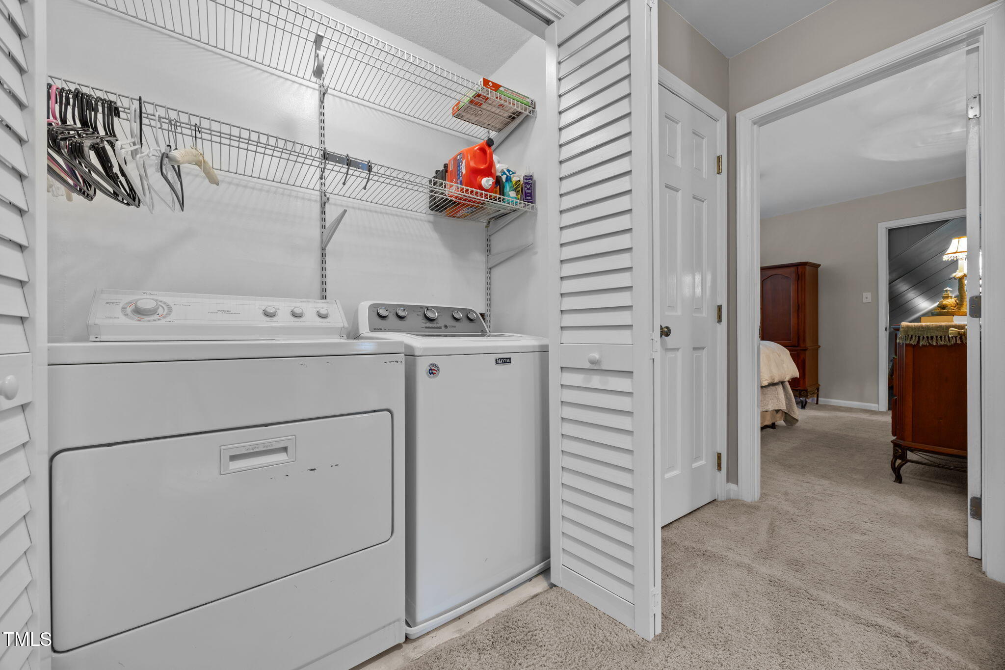 8009 Running Cedar Trail Raleigh, NC 27615 - Photo 30 of 42 a utility room with dryer and washer
