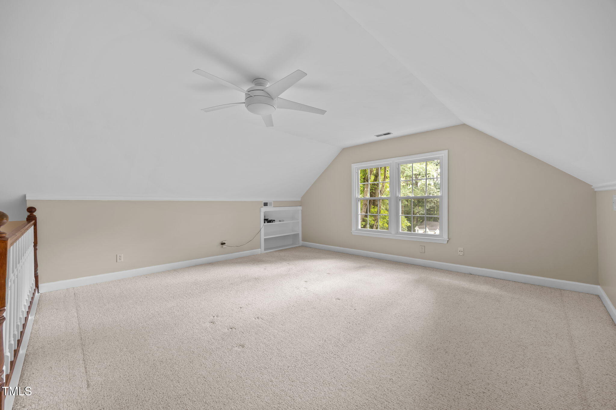 8009 Running Cedar Trail Raleigh, NC 27615 - Photo 31 of 42 a view of an empty room with a window
