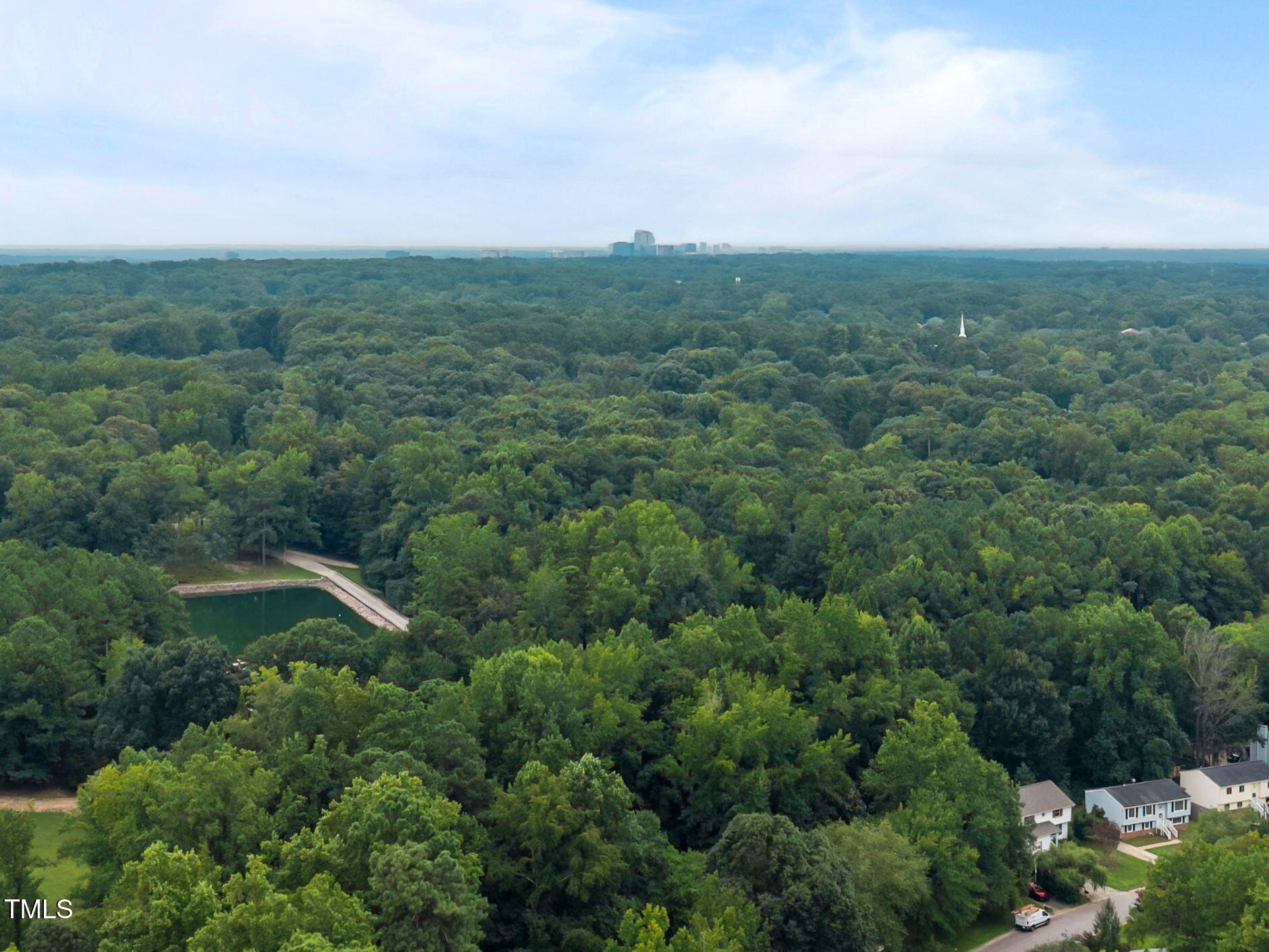 8009 Running Cedar Trail Raleigh, NC 27615 - Photo 34 of 42 an aerial view of residential house with outdoor space