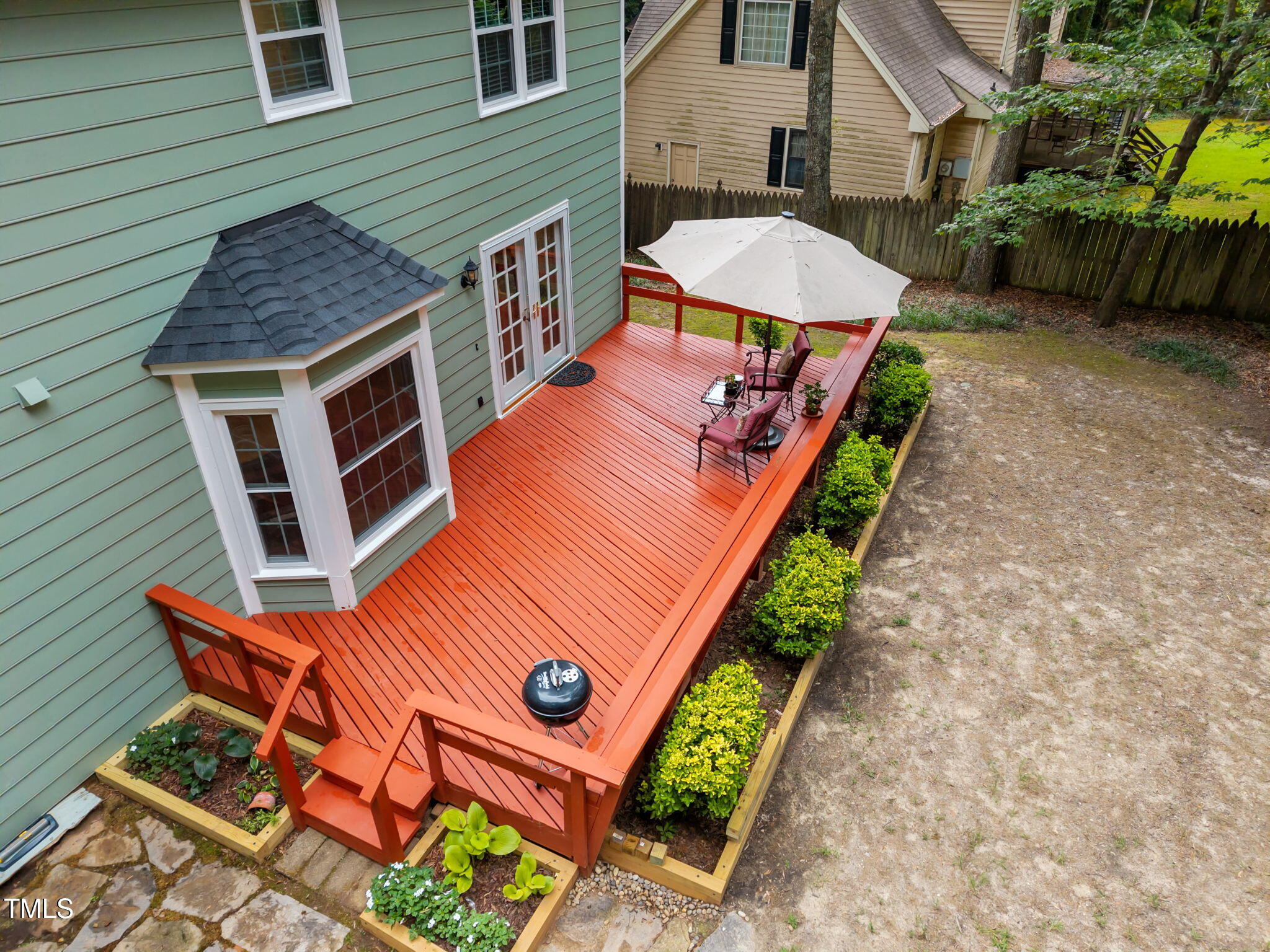 8009 Running Cedar Trail Raleigh, NC 27615 - Photo 39 of 42 an aerial view of a house with a yard and furniture
