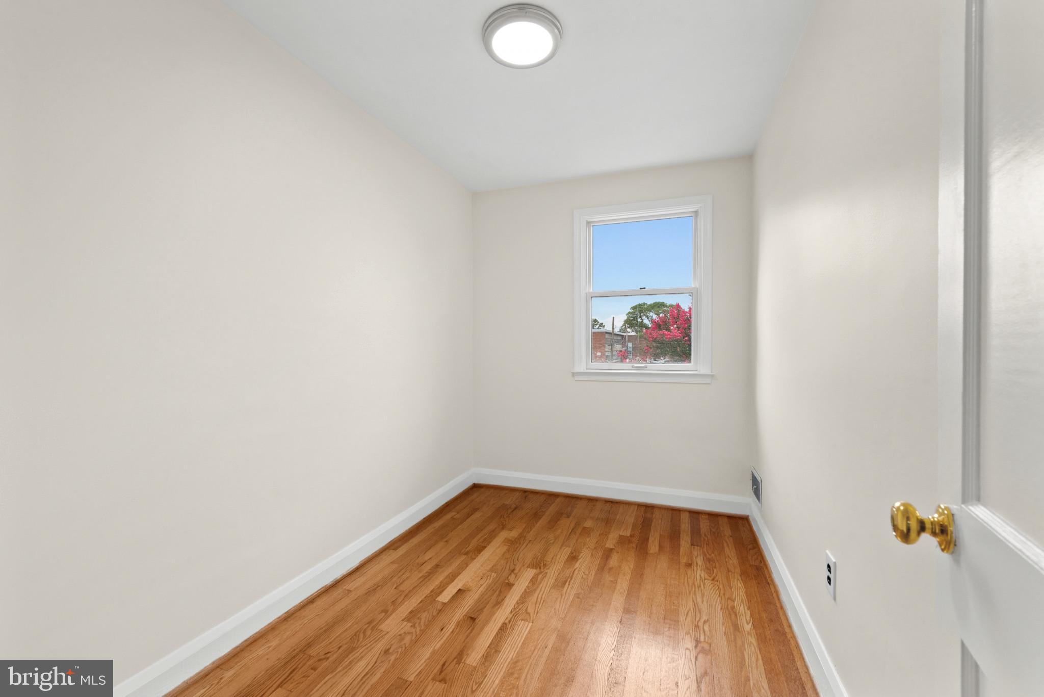 2207 Hawthorne Road Baltimore, MD 21220 - Photo 18 of 39 a view of a room with wooden floor and small space