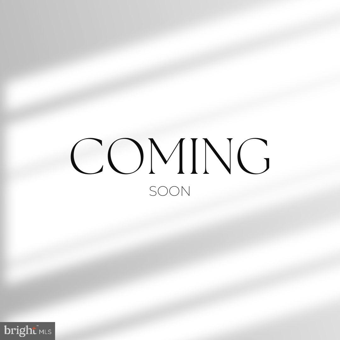 a view of a dry room with wooden floor